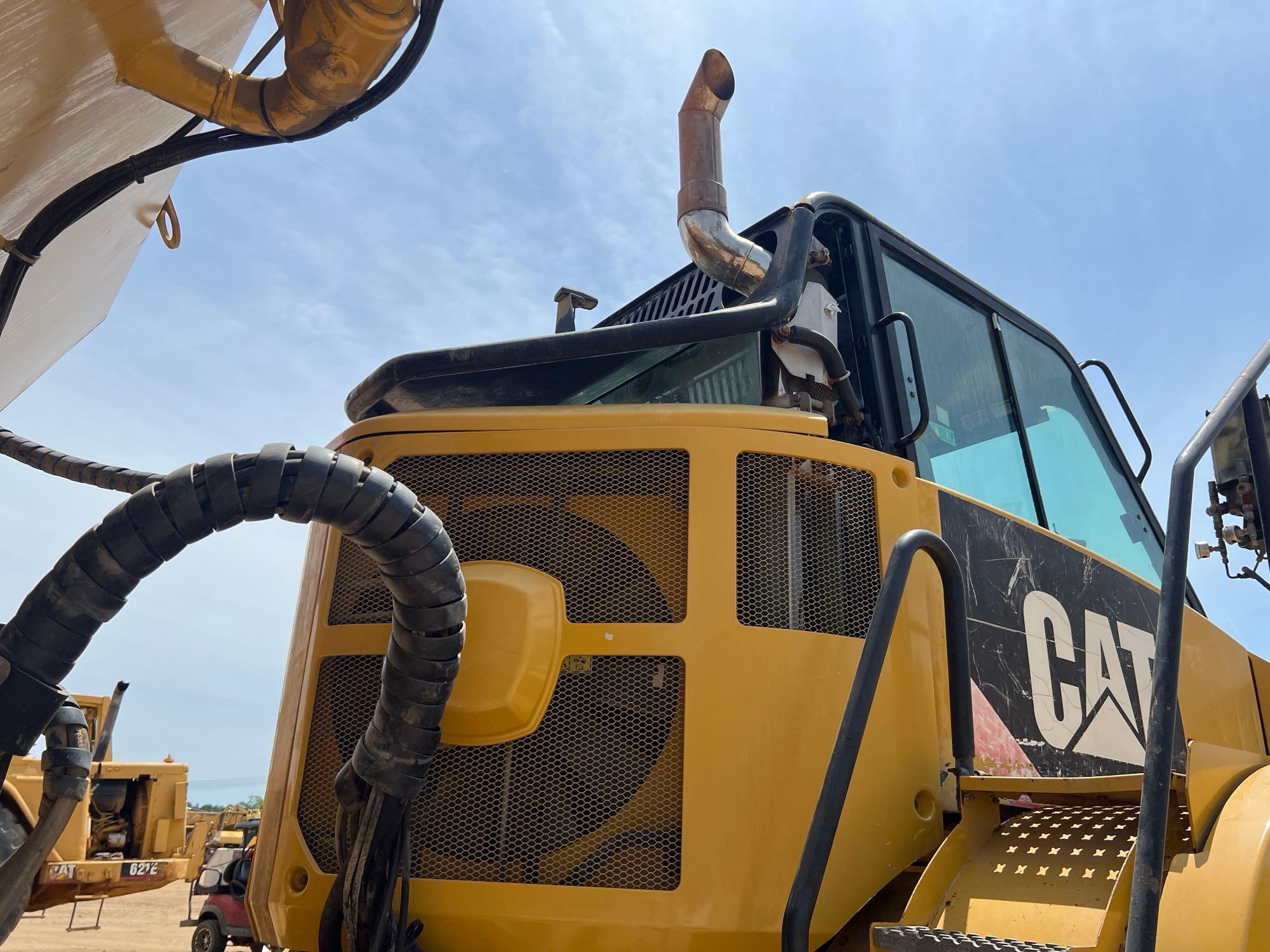 2015 CATERPILLAR 730C 6X6 OFF ROAD WATER TRUCK