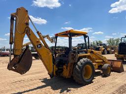 1990 JOHN DEERE 310C BACKHOE