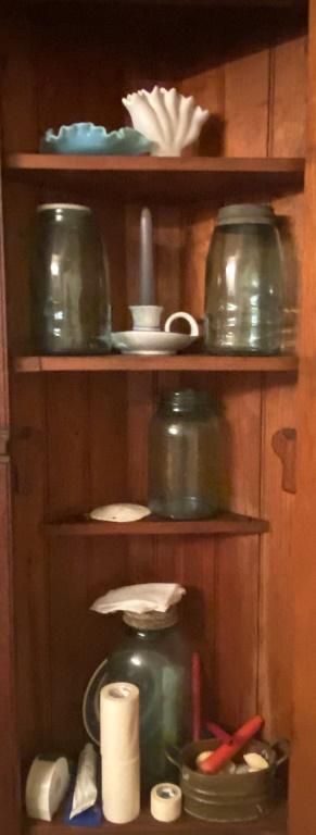 CONTENTS OF WALL HANGING CORNER CABINET