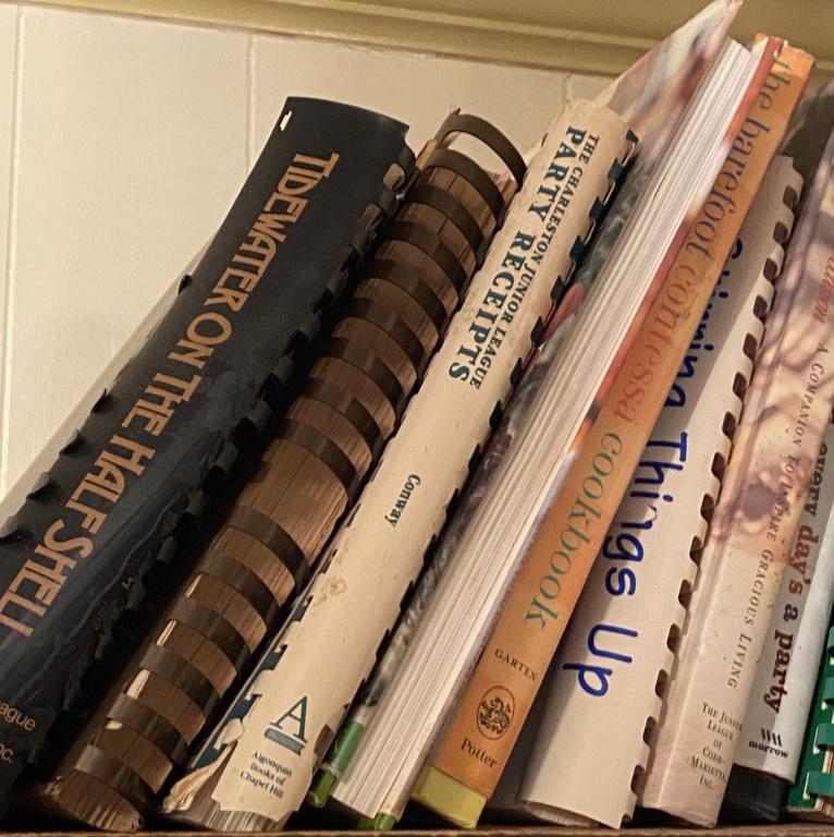 TWO SHELVES OF COOKBOOKS