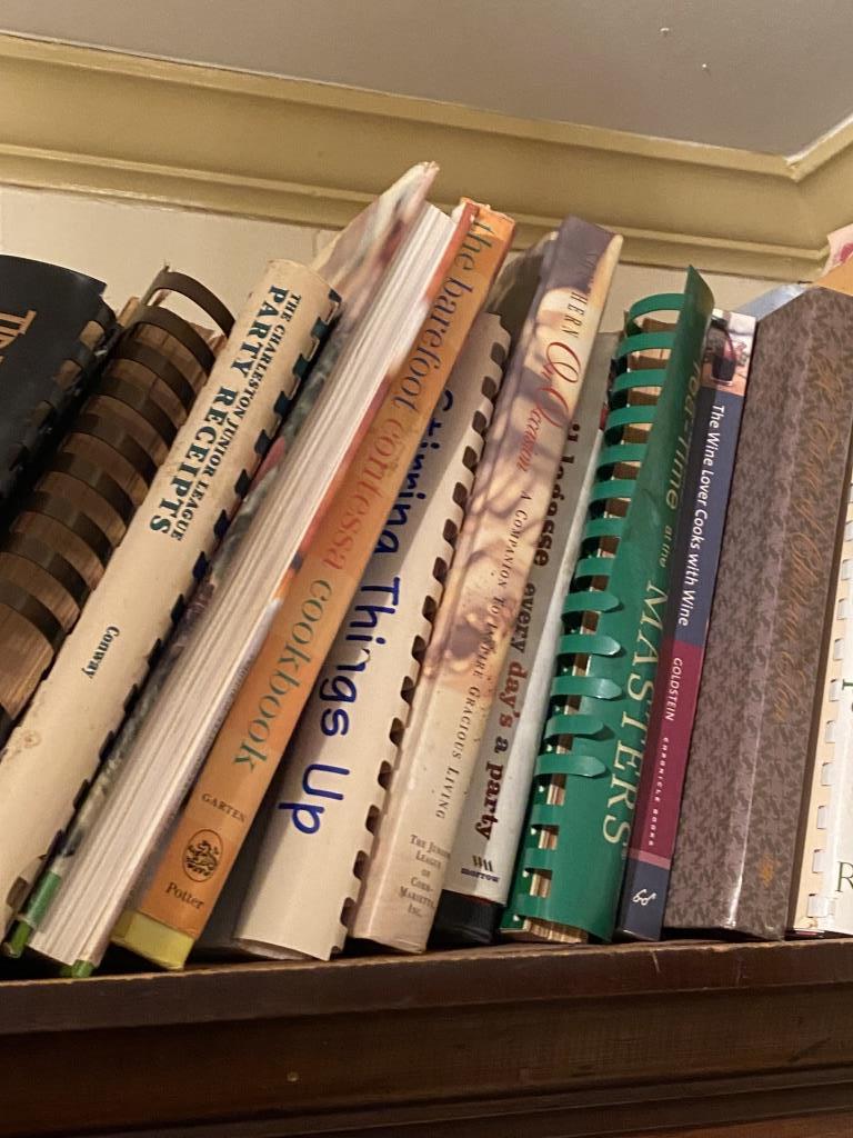 TWO SHELVES OF COOKBOOKS