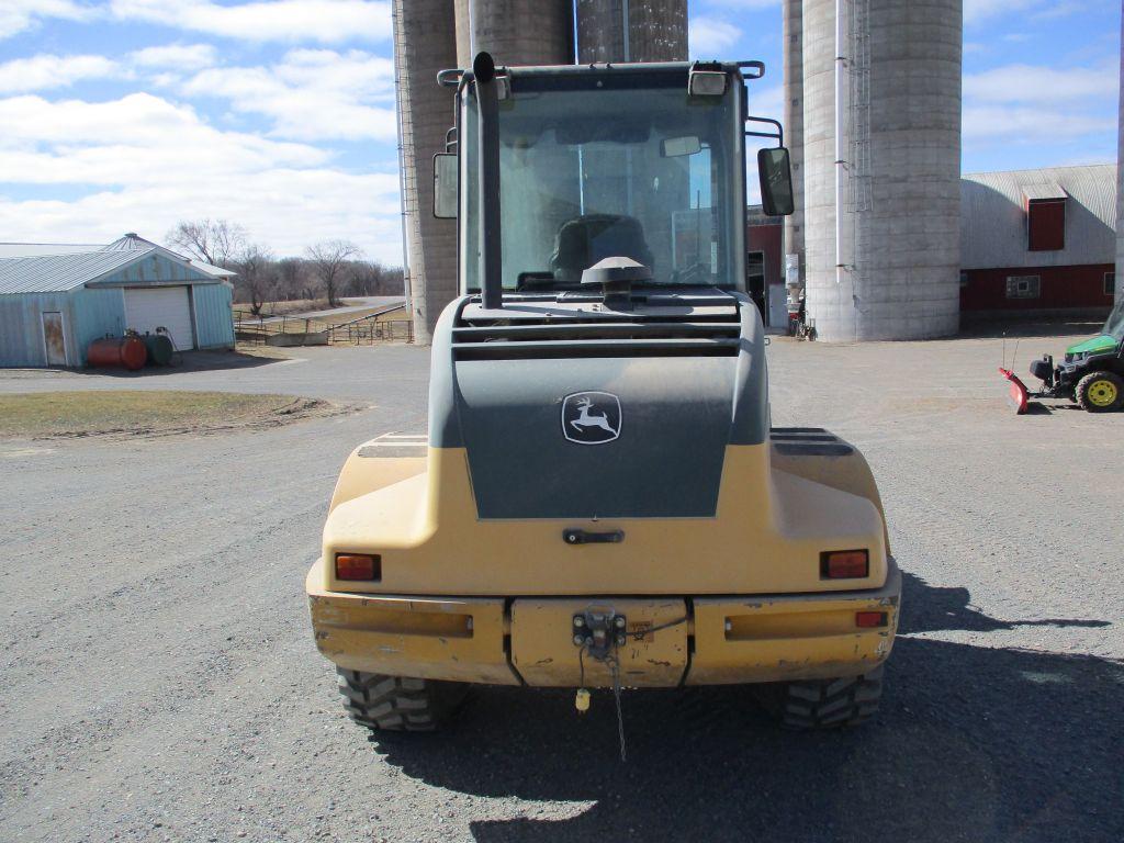 2013 John Deere 324J, 13,965 Hrs. 4x4, cab. AC, heat, JRB coupler, Aux Hyd, bucket, New tires, top