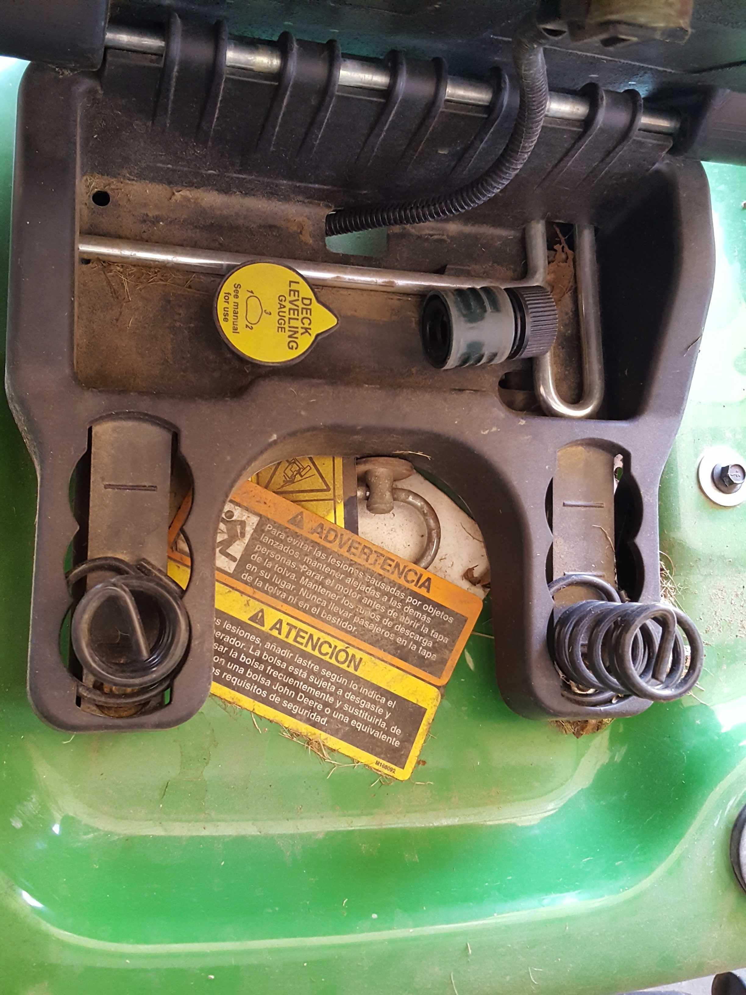 John Deere X300, 42 inch, riding mower with bagging system parts. needs delivery tube system for