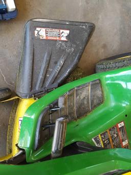 John Deere X300, 42 inch, riding mower with bagging system parts. needs delivery tube system for