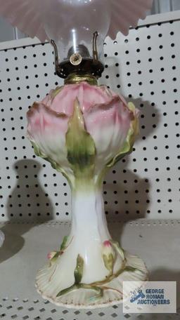 Floral oil lamp with pink shade