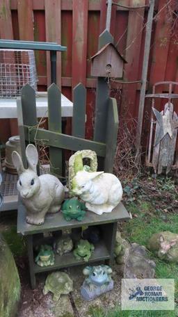 Wooden outdoor birdhouse table with yard figurines