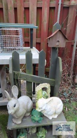 Wooden outdoor birdhouse table with yard figurines