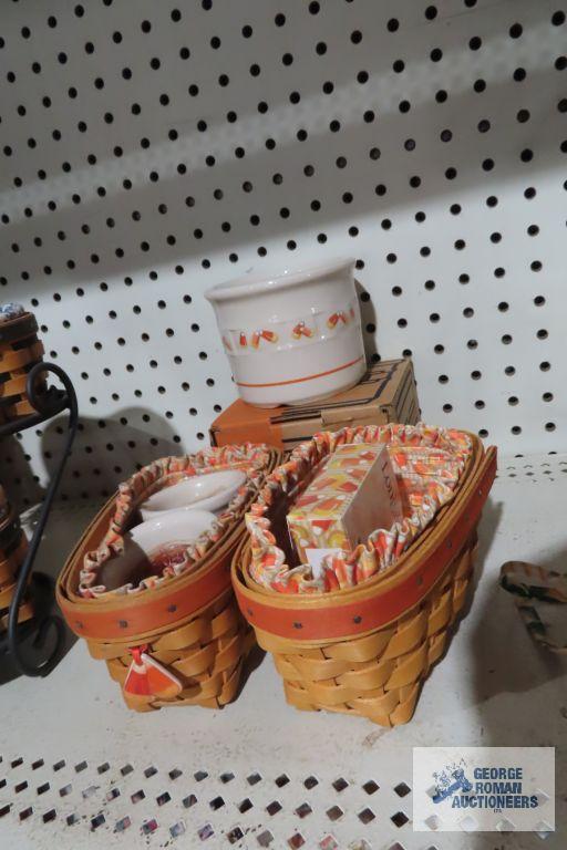 Longaberger...(2) candy corn baskets and pottery