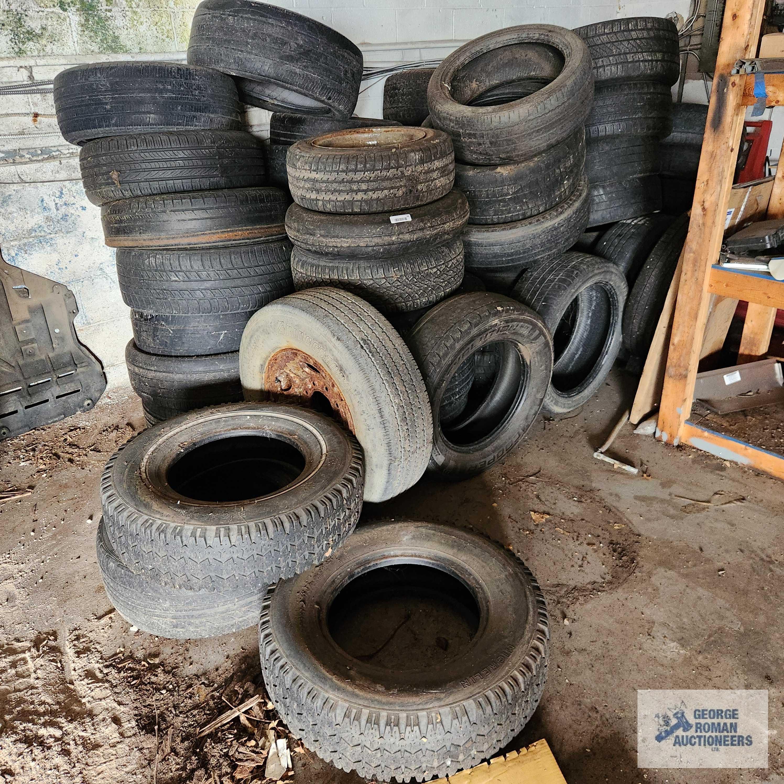 Lot of assorted tires and rims. Must take all