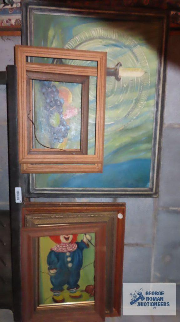 lot of picture frames and oil on board paintings