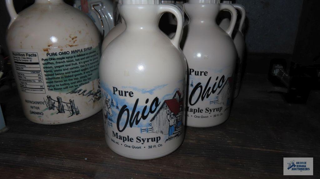 Ohio pure maple syrup plastic jugs, two Pepsi bottles, and Beam decanter