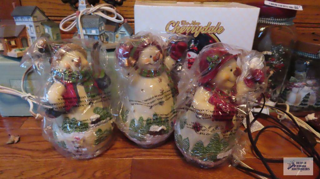 Lot of Christmas figurines and houses