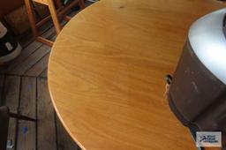 Oak finish round table with metal base