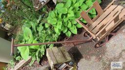 Vintage infant sled with wheels and handle