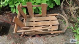 Vintage infant sled with wheels and handle