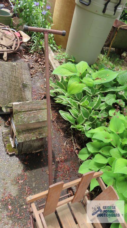 Vintage infant sled with wheels and handle