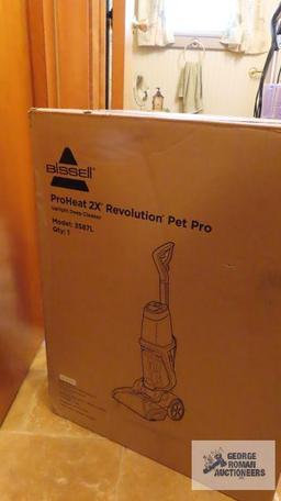 New in the box, revolution, pet pro upright, deep cleaner by Bissell