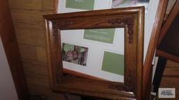 Large variety of picture frames, mostly wooden