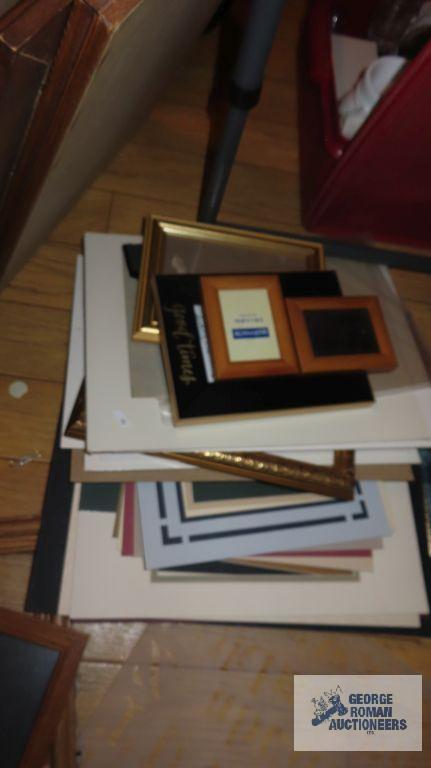 Large variety of picture frames, mostly wooden