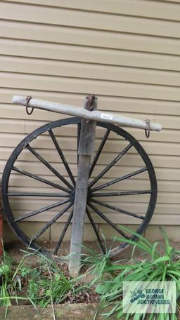 Double tree with antique wagon wheel