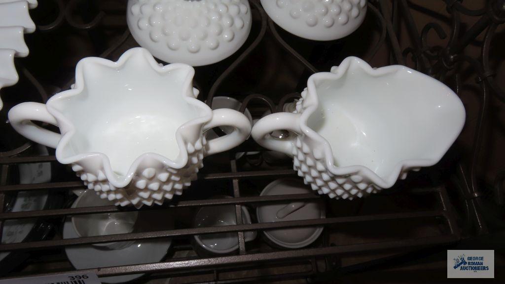 Milk glass two tiered cookie tray, creamer and sugar, and candle holders