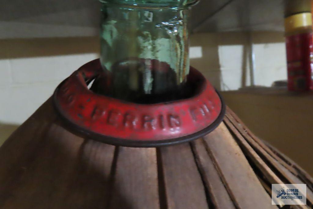 Handled basket with glass jug