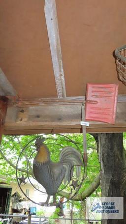 Antique rug beater and rooster decoration