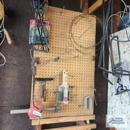 Lot of small hand saws, retractable dog leash, hardware and etc