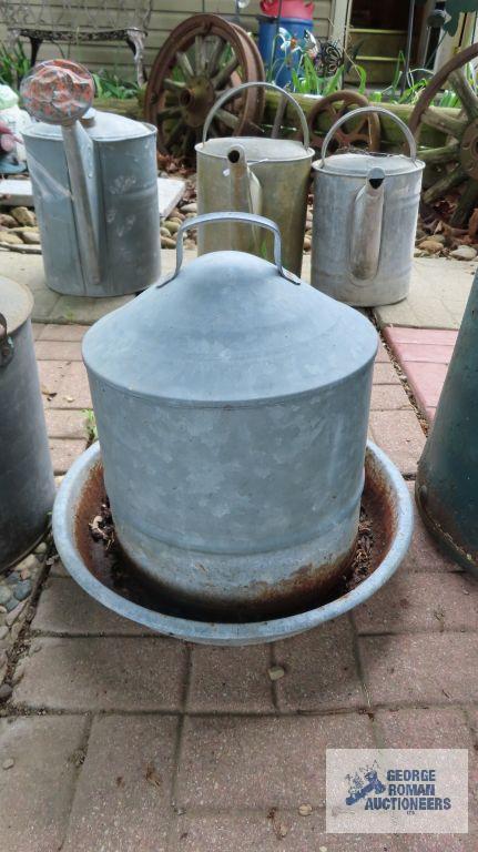 Chicken feeder, milk can and antique oil can