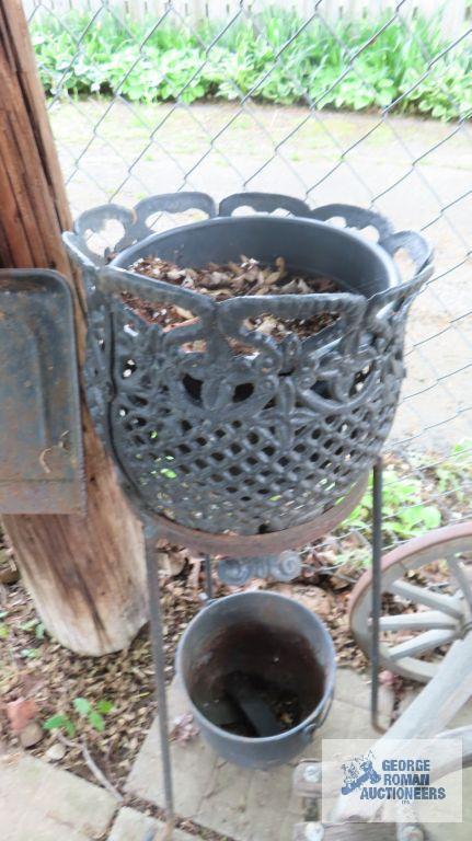 Cast iron cauldron and cast iron planter with stand