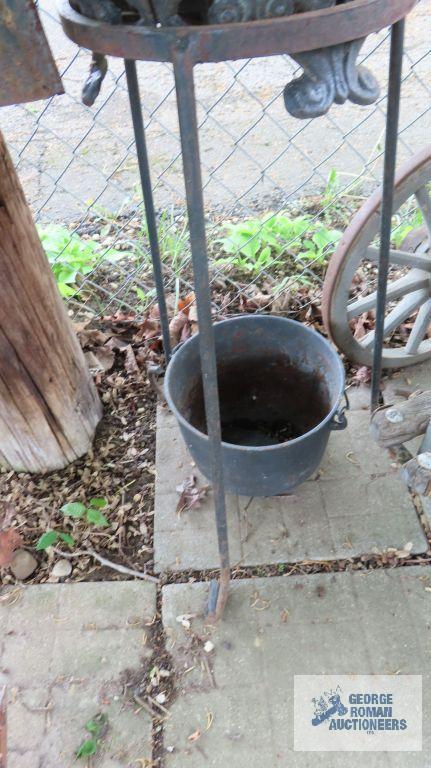Cast iron cauldron and cast iron planter with stand