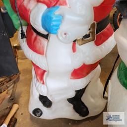 Santa Claus plastic lighted outdoor decoration, approximately 4 ft tall