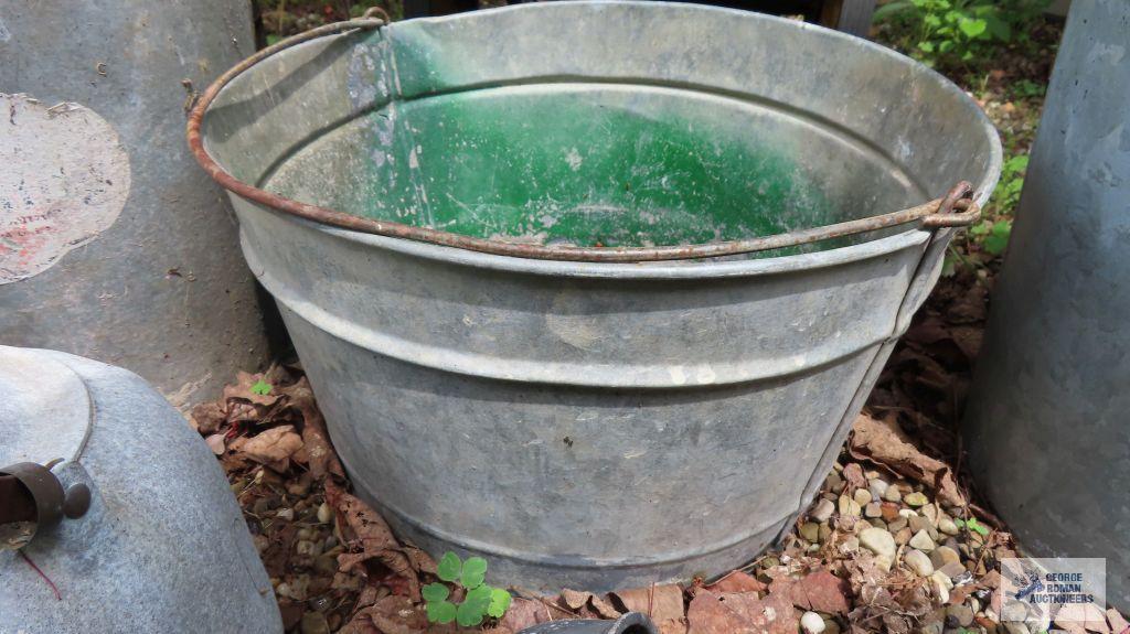 Hammered aluminum kettle, chicken feeder parts, and metal buckets