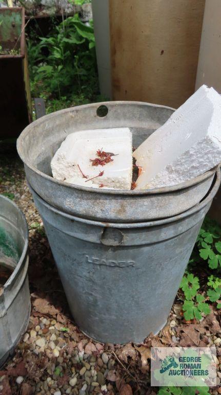 Hammered aluminum kettle, chicken feeder parts, and metal buckets