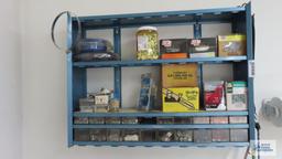 Assorted hardware on blue wall shelf, shelf is included