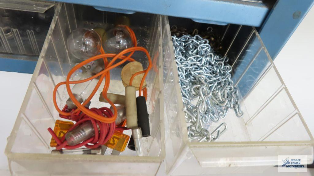 Assorted hardware on blue wall shelf, shelf is included