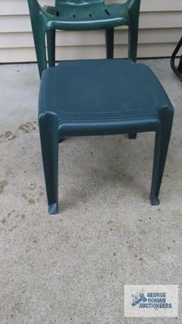Plastic outdoor chair and small table