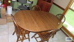 Table with two leaves and four chairs