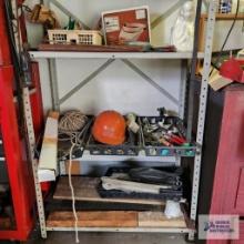 Lot of hard hats, hardware and etc on shelving