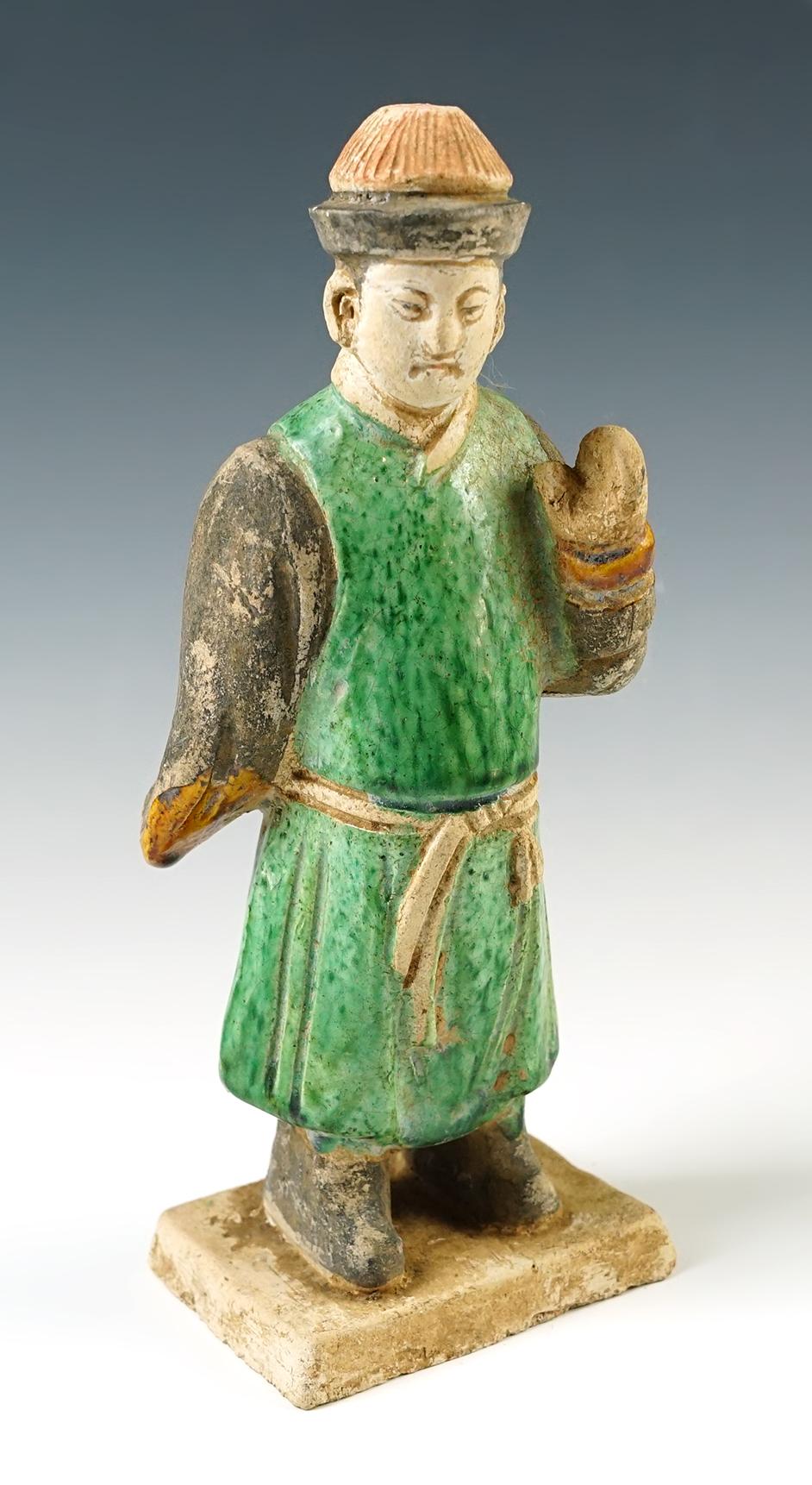 8 " tall Chinese male figure from the Tang Dynasty, cira A.D 618- 907. In excellent condition.