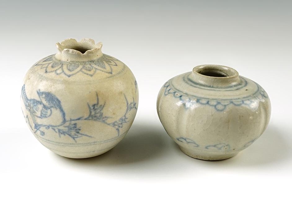 Pair of pottery vessels from the Hoi An Hoard with original catalog number stickers on bottom.