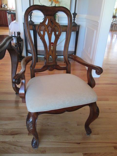 Beautifully Carved Mahogany Finish Dining Table, Armchairs, Side Chairs and Leaves