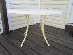 Round Fiberglass Table with Metal Bamboo Look Legs