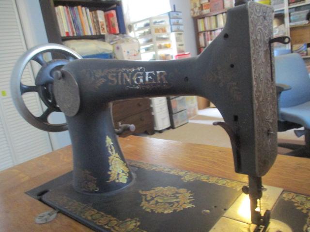 Antique Singer Treadle Sewing Machine in Tiger Oak Cabinet