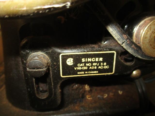 Antique Singer Sewing Machine in Cabinet