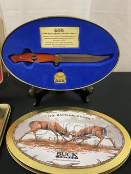 Two Tin Sets of Buck Knives, Models 112 100th Anniversary & Battling Bucks 727 Commemorative series