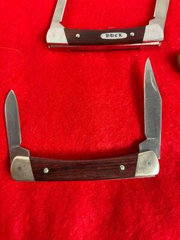 4x Buck Folding Pocket Knives 1x Single Blade 2x Dual Blade 1x Triple Blade Numbered 705,709,703,...