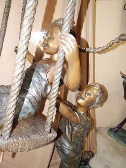 LARGE KIDS SWINGING BRONZE SCULPTURE