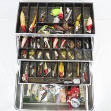 Vintage tackle box with lures and gear