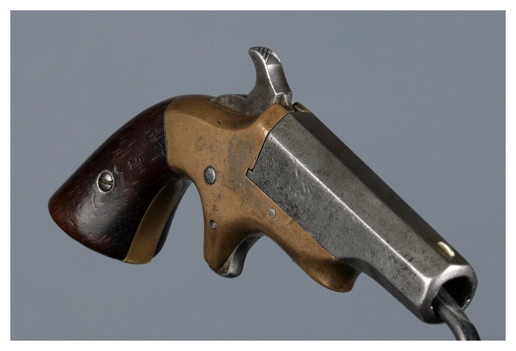 Two Brown Manufacturing Co. Southerner Derringer Pistols